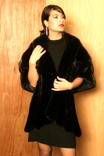 Fashion model showing a fur coat made by Yukon Fur in Toronto